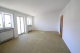 Wohnzimmer - Direkt im Zentrum – 2-Zimmerwohnung mit TG-Stellplatz